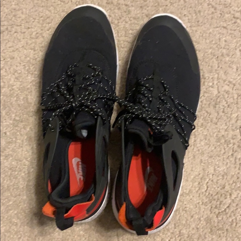 Nike open back black running or casual wear.